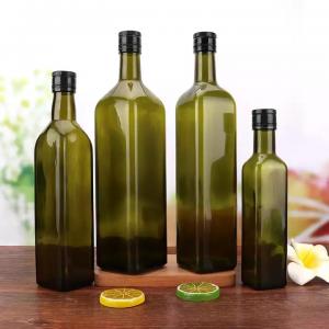 An empty bottle of olive oil beloved by customers