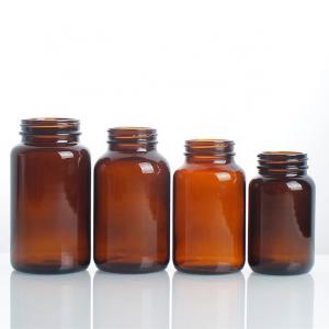 Clear or amber capsule/pill glass medicine bottles
