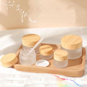 Frosted cosmetic glass jar with bamboo lid 