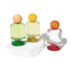 Wholesale Price 30ml 50 ml 100ml Empty Luxury Transparent Glass Perfume Bottle with Colored Spherical Cap